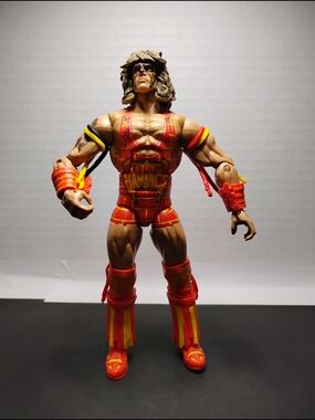 WWE Ultimate Warrior Action Figure - Red & Yellow Wrestling Gear